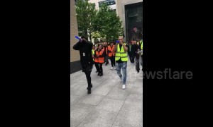 Employees of the catering service for London’s Facebook headquarters hold protest