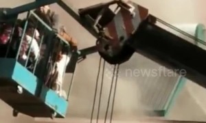 Hero drives crane to save residents trapped in building fire in northern China