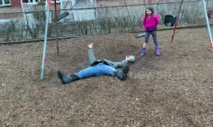 Canada dad ends up flat on his back after failed flip off swing set