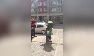 Mascots head goes rolling after hugging young boy