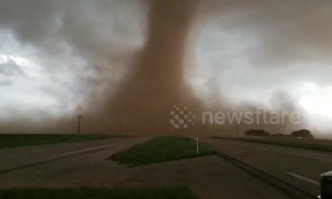 Storm chasers film terrifylingly close up tornado in Texas