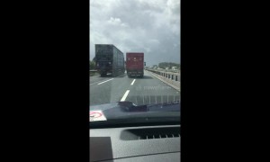 Royal Mail lorry seen dangerously and illegally using two lanes on the motorway