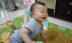 Adorable 'growling' baby experiments with new sound