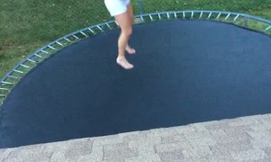 Back Flip on Trampoline Sends Girl to the Ground