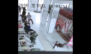 Sliding into danger! Chinese firemen answer emergency call but slip on floor