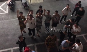 Chinese tourists in Thailand dazzle in matching elephant suits