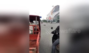 Leaking gas causes manhole covers to 'dance' on Chinese road