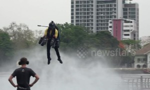 British 'Iron Man' flies jet suit in gridlocked Bangkok claiming it will be the 'future of travel'