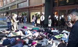 Extinction Rebellion activists hold dramatic "die-in" outside Harrods and one rants at security guards