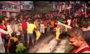 Hundreds of devotees walk barefoot over bed of hot embers in Indian festival