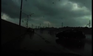 Officer escapes hydroplaning car at the last possible moment