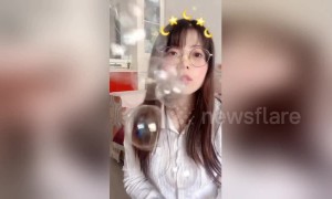 Chinese girl turns herself into 'human bubble machine'