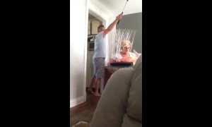 Canadian woman screams and jumps out chair after spider prank