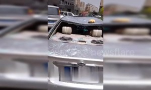 Powerful winds rip off building walls in north China, injuring one