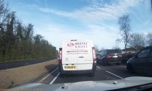 Car Runs Two Red Lights Nearly Hitting Pedestrian