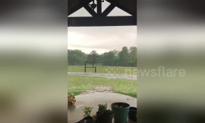 Oversized hailstones pour down on Oklahoma home