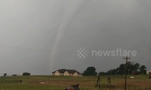 Powerful tornado tears through Oklahoma fields