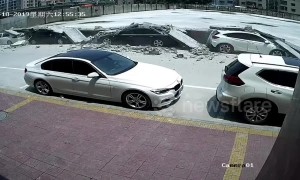 Wall collapses and damages 13 parked cars in China's Guangdong