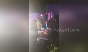 Emergency services rescue sleeping truck driver hit by Missouri tornado