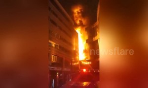 Firefighters on the scene as a mall in China goes up in flames