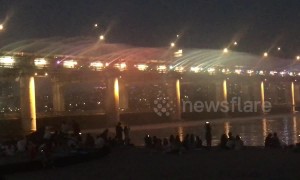 Motorway bridge turned into fountain light show in Korea