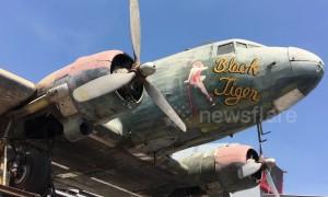 Just a plane coffee please! Thai cafe has WWII aircraft ON ROOF