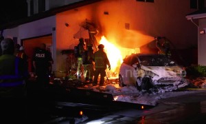 Firefighters tackle blaze after car slams into California home