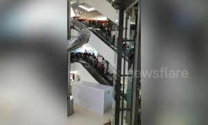 Hundreds of K-Pop fans stampede down escalators to see boyband