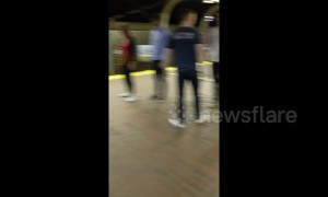 Elderly man starts impromptu session of Tai Chi at Boston train station