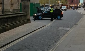 Delivery Driver Stuck to Safety Bollard
