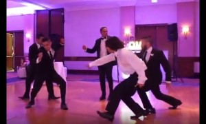 Groomsmen pull off surprise wedding dance for newlyweds