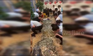 Chinese businessman uses 16 buckets of coins to pay for property
