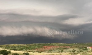 Huge storm clouds loom over Texas grasslands before floods hit town