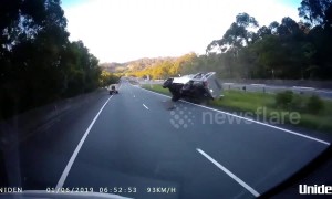 Flipping hell! Dashcam captures truck rolling into oncoming traffic in Australia