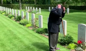 World War II Veteran Pays Respects to Fallen Friend