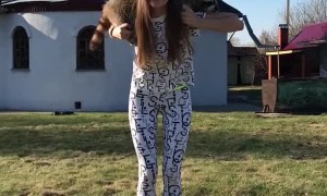 Russian Works Out with Her Raccoon