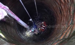 Chinese girl clings onto bed sheets for 15 minutes after falling down a well