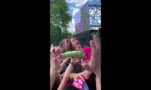 Singer Kate Nash crowd surfs on top of fans at London Mighty Hoopla festival