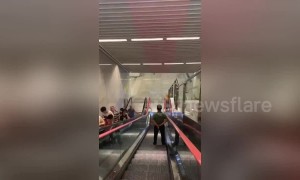 Watch commuters descend into China’s deepest subway station which is 31 storeys below the ground