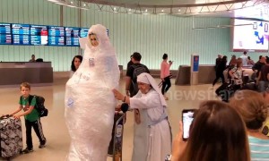 Virgin Mary wheeled around LAX