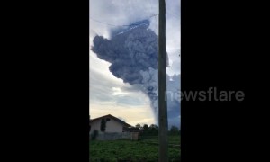 Massive ash cloud billows into air in North Sumatra following volcano's eruption