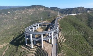 Spectacular drone footage of 3-storey highway built along China's Tianlong Mountain