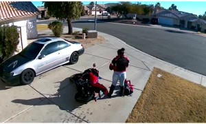 Rider Wrestles with Wheels