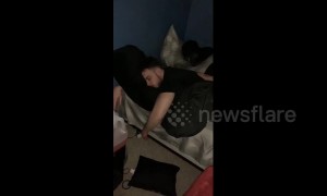 Drunk man dances lying in bed thinking he’s still at the club