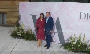 Former British PM David Cameron arrives with wife Samantha at the V and A Museum Summer Party
