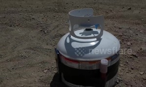 iPhone XS inside a filled propane tank: will it survive?