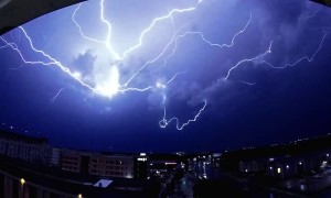 Slow Motion Lightning Strike Streaks Across Sky