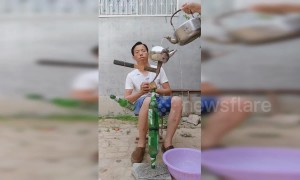 Talented Chinese man shows off incredible bottle balancing skills