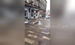 'Stirling water park open for business!' Severe rainfall sees high street completely submerged