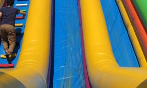 Daughter on Slide Takes a Dive